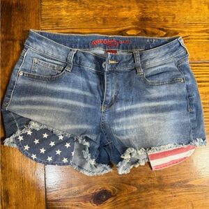 Arizona Jean Company Blue Jean Shorts with Distressed American Flag Design